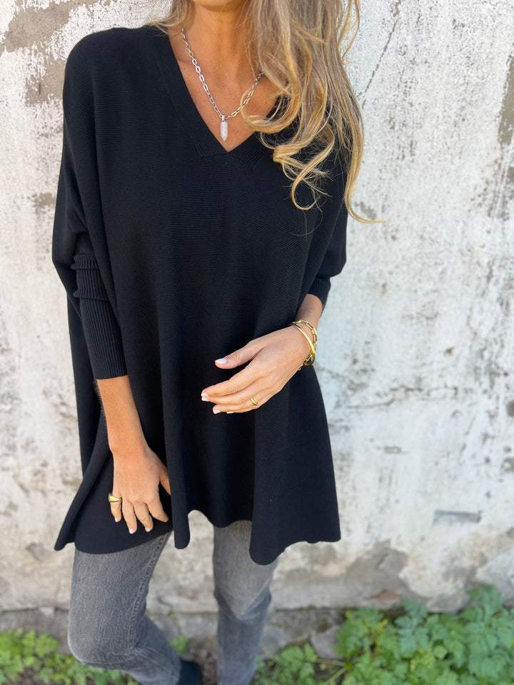 Women’s Oversized V-Neck Shirt with Drop Shoulders and Long Sleeves
