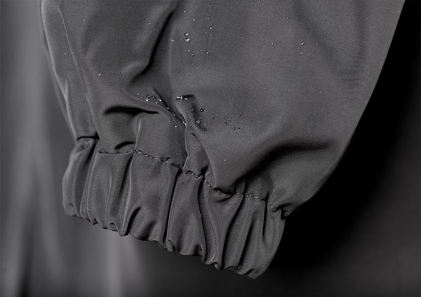 Women's Oversized Rain Jacket with Hood Button Front and Pockets